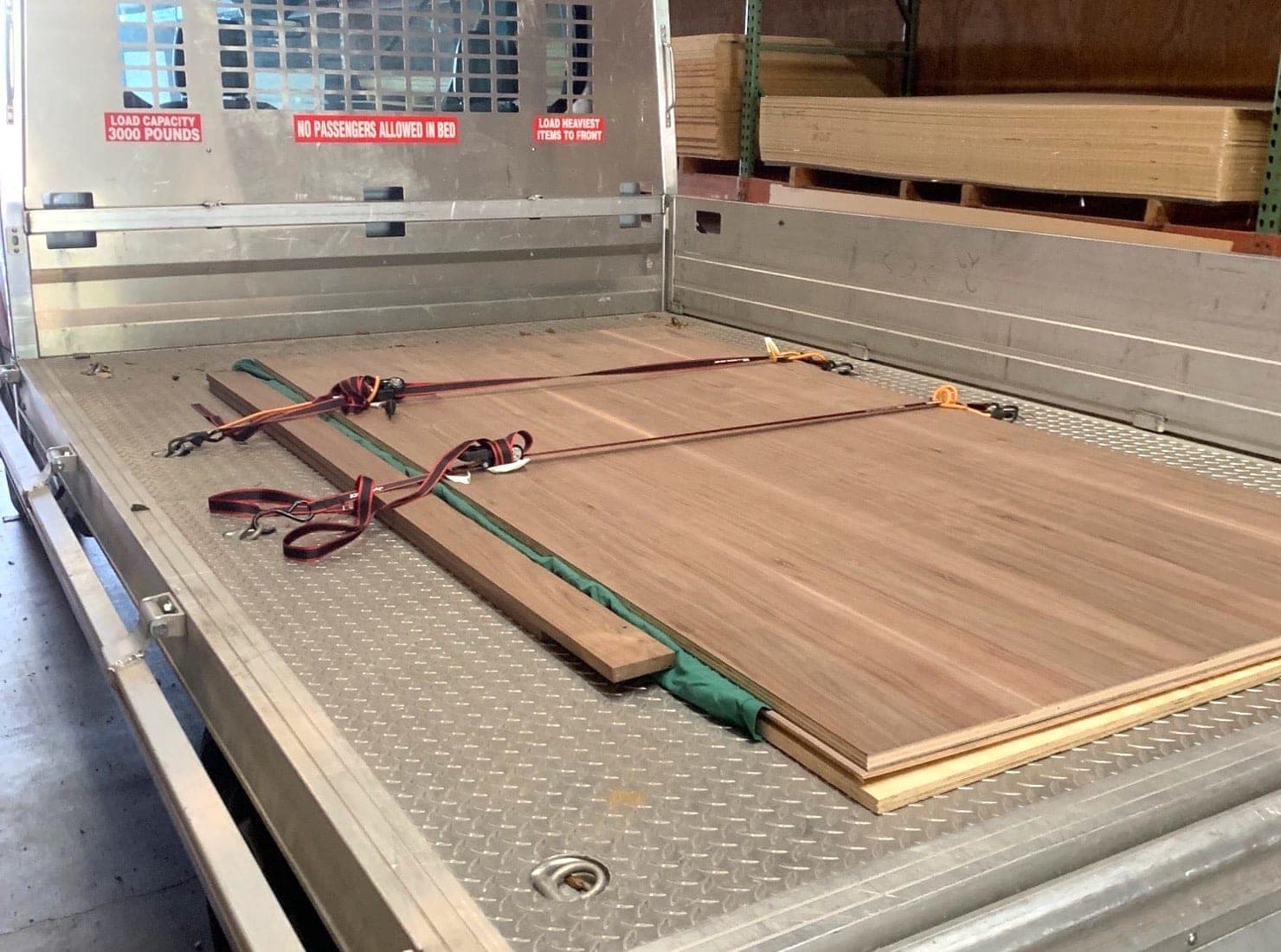 pickup truck loaded with wood