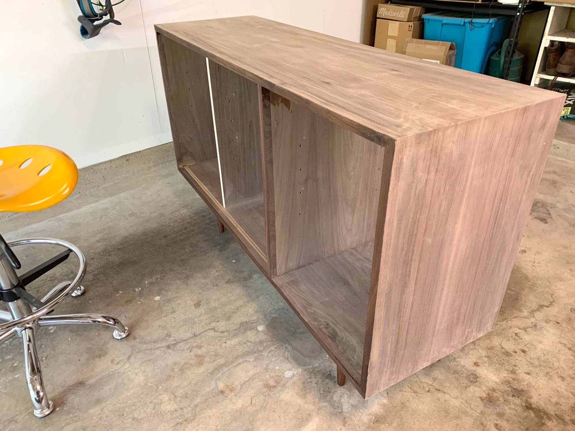 credenza before first coat applied, wood is pale and light