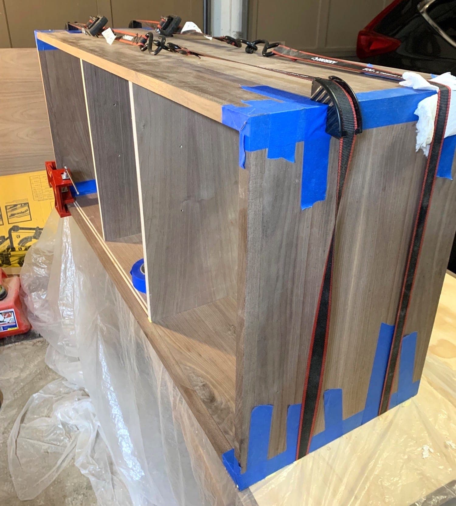 everything glued up with ratcheting straps around it
