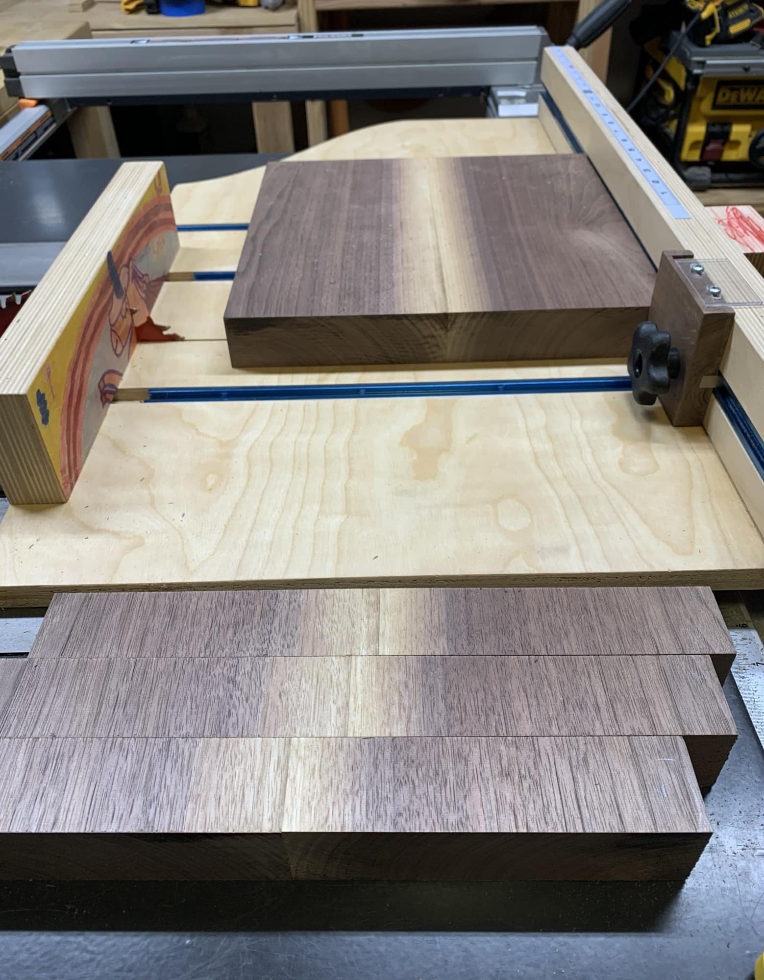 Picture of the board being chopped into strips on a table saw