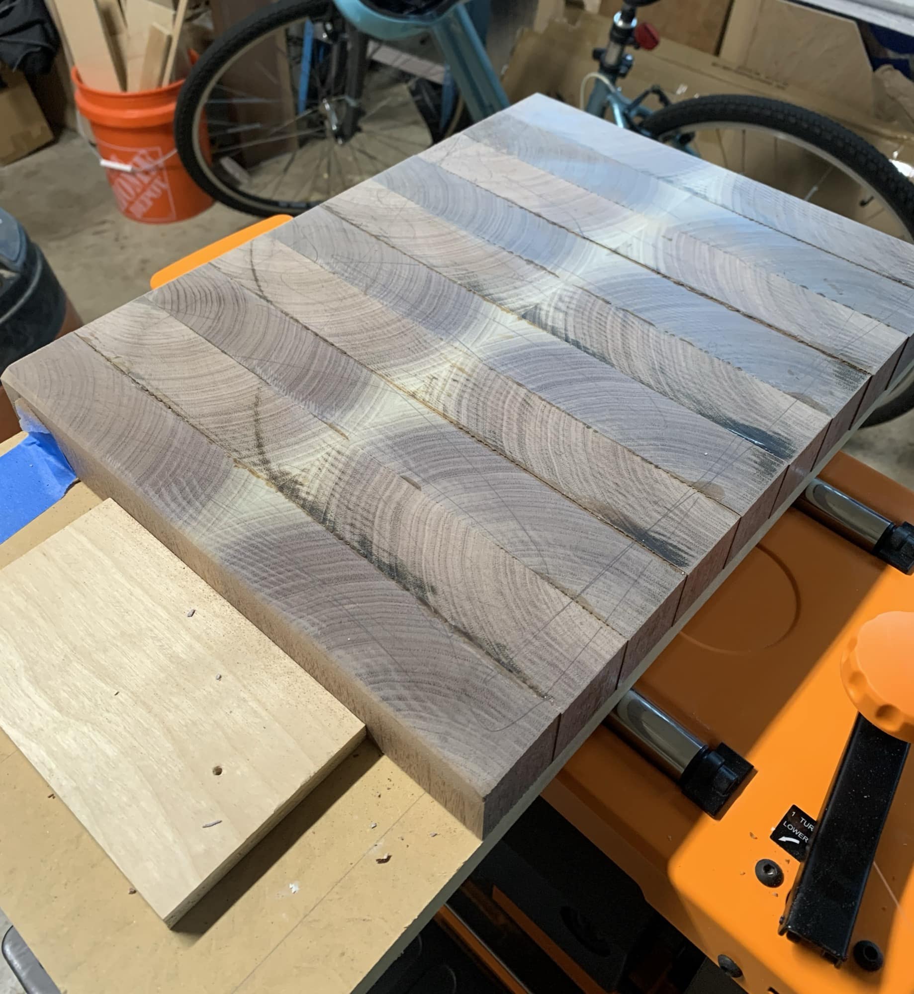 Rough looking board about to be run through the planer