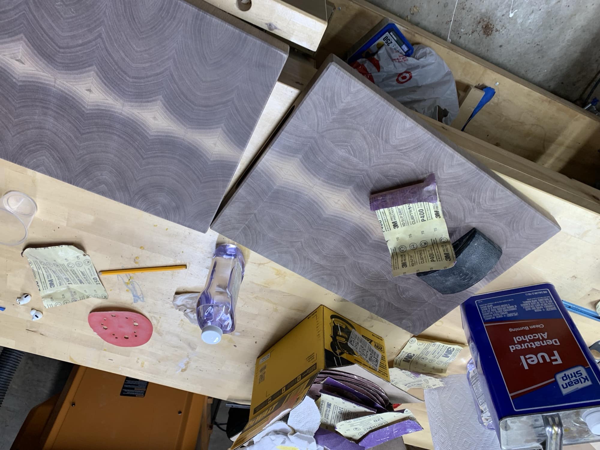 Picture of two cutting boards being sanded