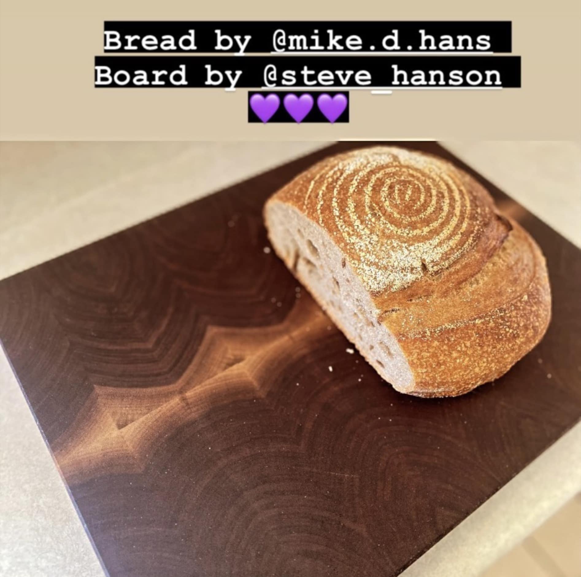 Social media post from my brother. Shows a fresh loaf of bread on the cutting board